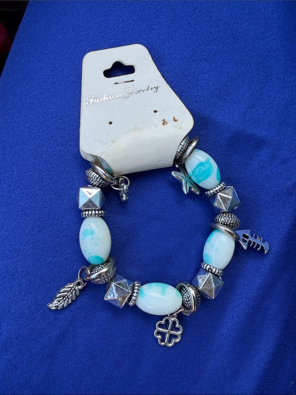 Silver Charm Bracelet with Light Blue Beads - Fashion Jewelry